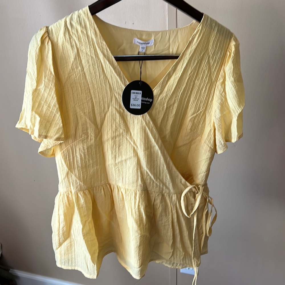 Yellow cross front peplum top
